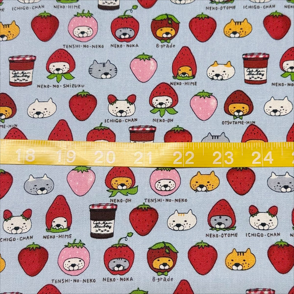 Scale of Strawberry Cats canvas fabric by Cotton Kobayashi, cotton linen blend with playful cats dressed as strawberries