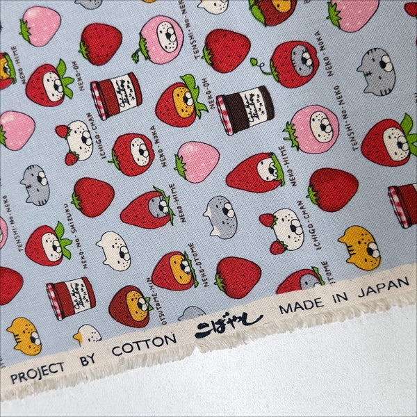 Selvage of Strawberry Cats canvas fabric by Cotton Kobayashi, cotton linen blend with playful cats dressed as strawberries