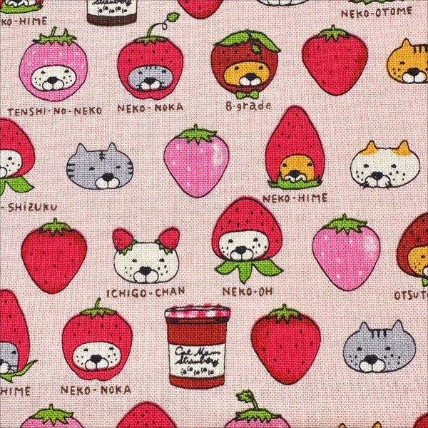 Close up of Strawberry Cats canvas fabric by Cotton Kobayashi, cotton linen blend with playful cats dressed as strawberries
