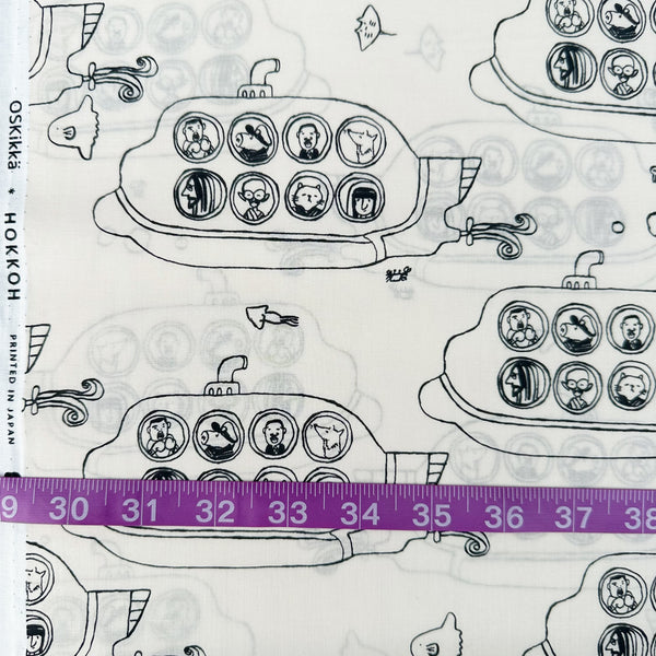 Scale of Submarine cotton lawn fabric by Hokkoh in natural, featuring black submarines