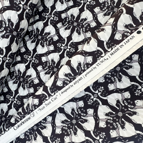 Selvage of Sun Sun Cat cotton oxford fabric by Yuwa in black, CO-159219-E