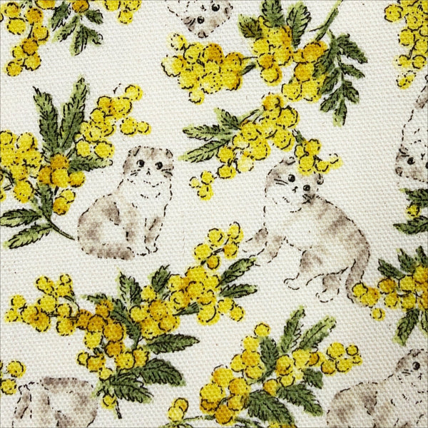 Close up of Sweeties Mimosa Cats cotton oxford fabric by Kokka in ivory, YKA-46020-1A