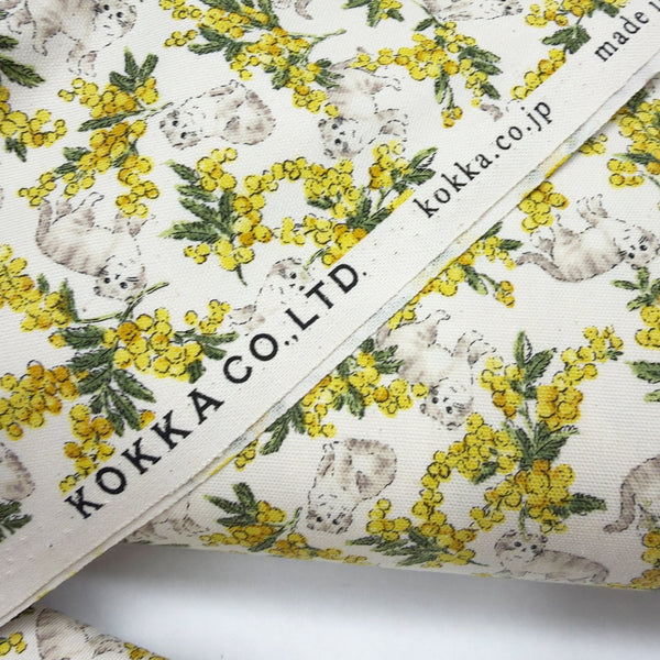 Selvage of Sweeties Mimosa Cats cotton oxford fabric by Kokka in ivory, YKA-46020-1A
