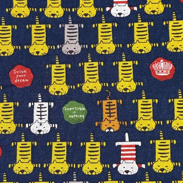Close up of Tiger Cat canvas fabric by Cotton Kobayashi, cotton linen blend imported from Japan