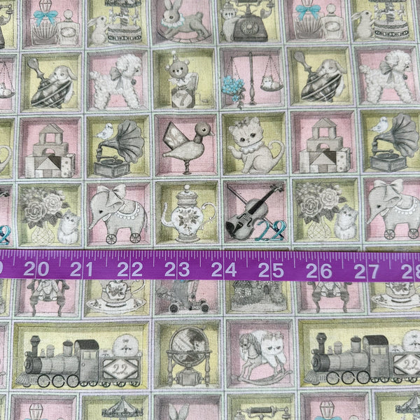 Scale of Toy Night Box cotton linen fabric by Yukiemon for Hokkoh featuring vintage-style toy illustrations arranged in boxes with soft pastel colors, imported from Japan