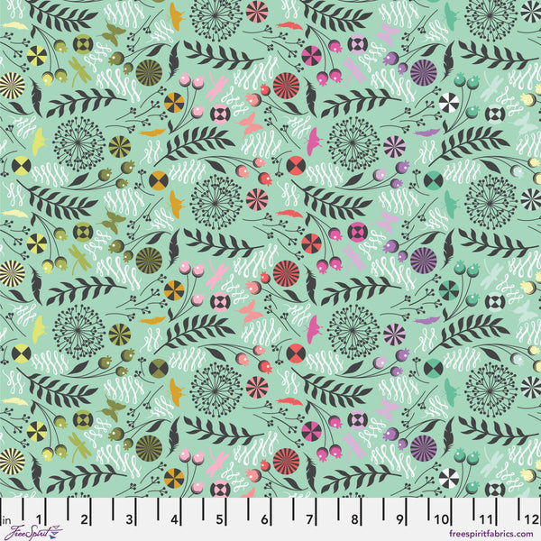 Dandelion fabric by Tula Pink shown with scale reference