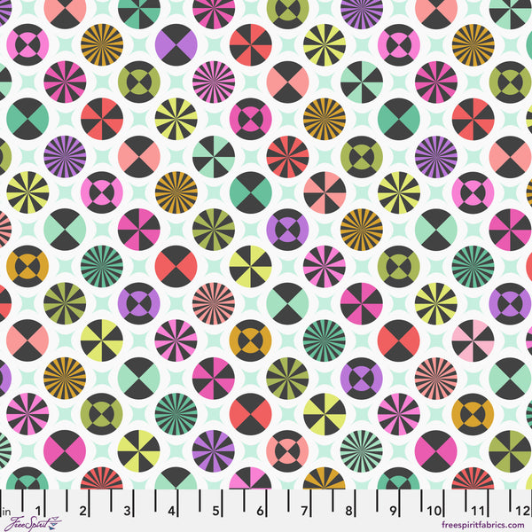 Taffy fabric by Tula Pink shown with scale reference