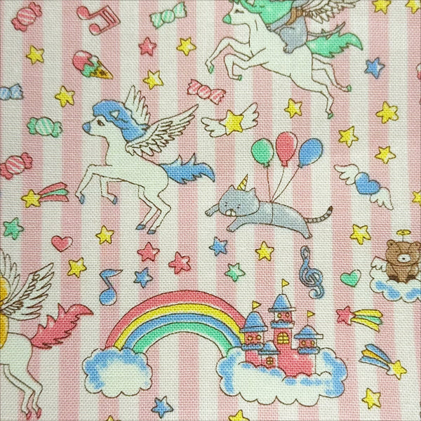 Close up of Unicorn Cats cotton linen blend canvas fabric in light pink by Cotton Kobayashi featuring whimsical cat and unicorn illustrations