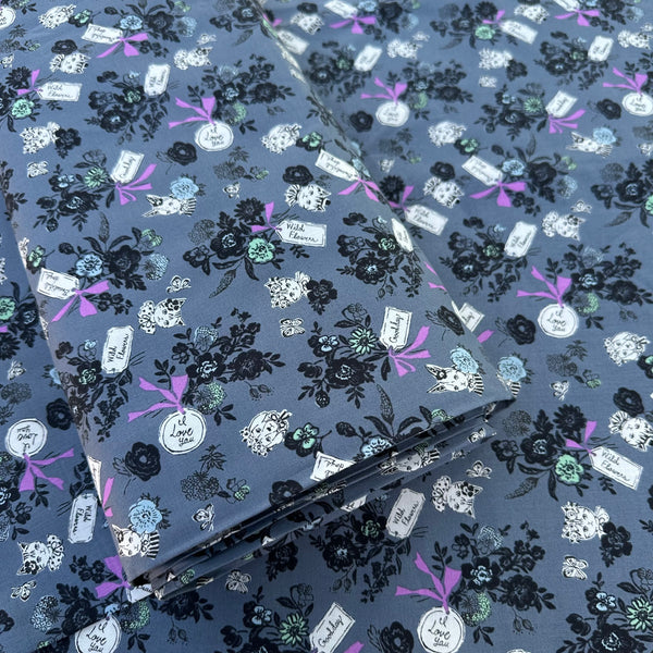 Bolt of Wild Flower Bouquet cotton fabric in Charcoal by Sobakasu Kids for Yuwa Fabrics featuring a detailed floral bouquet print