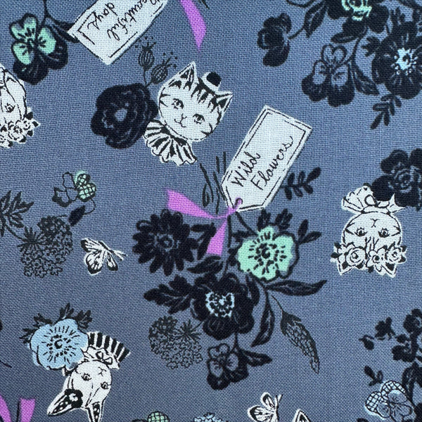 Close up of Wild Flower Bouquet cotton fabric in Charcoal by Sobakasu Kids for Yuwa Fabrics featuring a detailed floral bouquet print