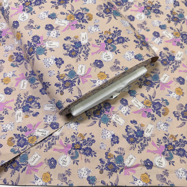 Bolt of Wild Flower Bouquet cotton fabric in tan by Sobakasu Kids for Yuwa Fabrics